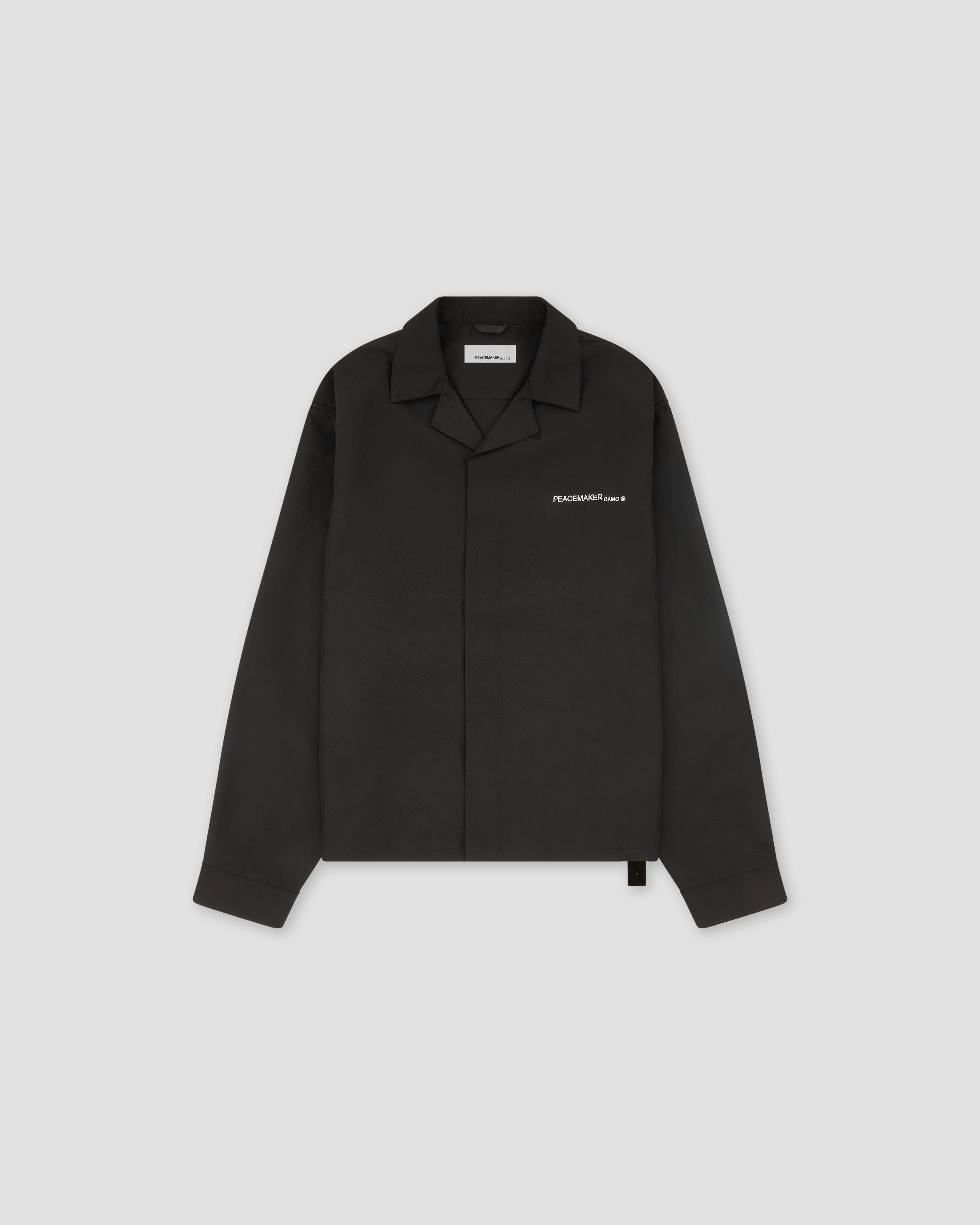 System Shirt Black | OAMC Peacemaker