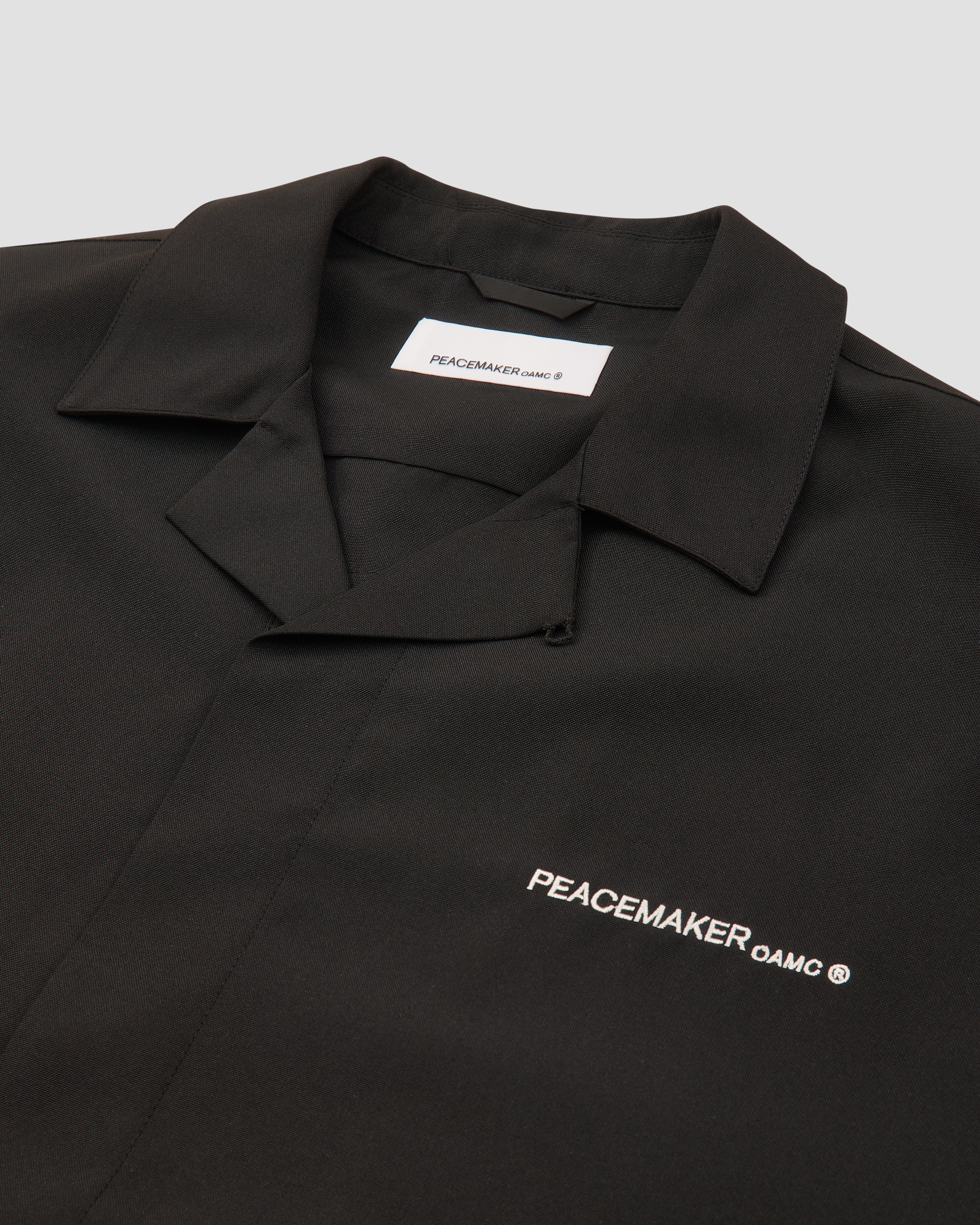 System Shirt Black | OAMC Peacemaker